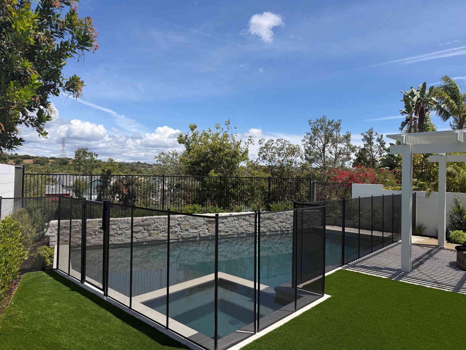 Removable mesh pool fence installation in Steiner Ranch Austin TX, All-Safe certified
